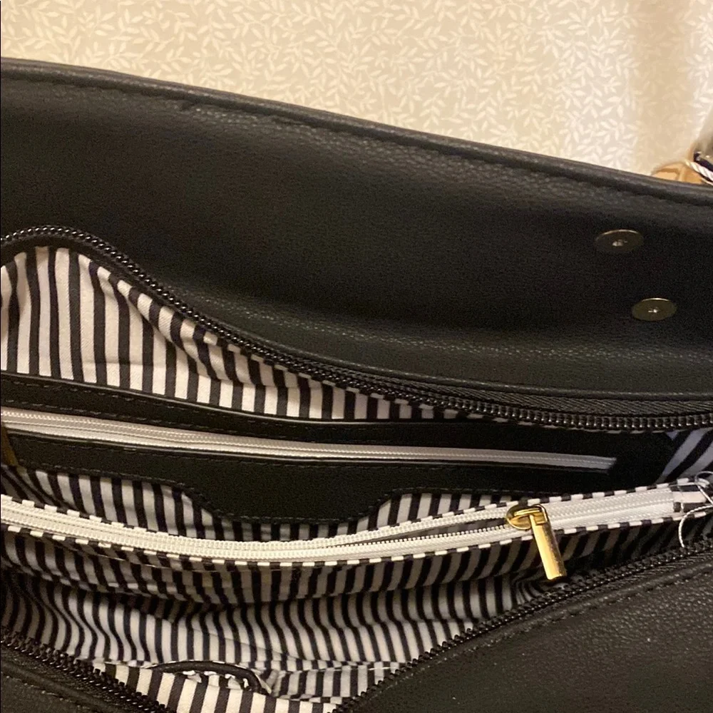 Elegant Black Handbag with Gold Accents